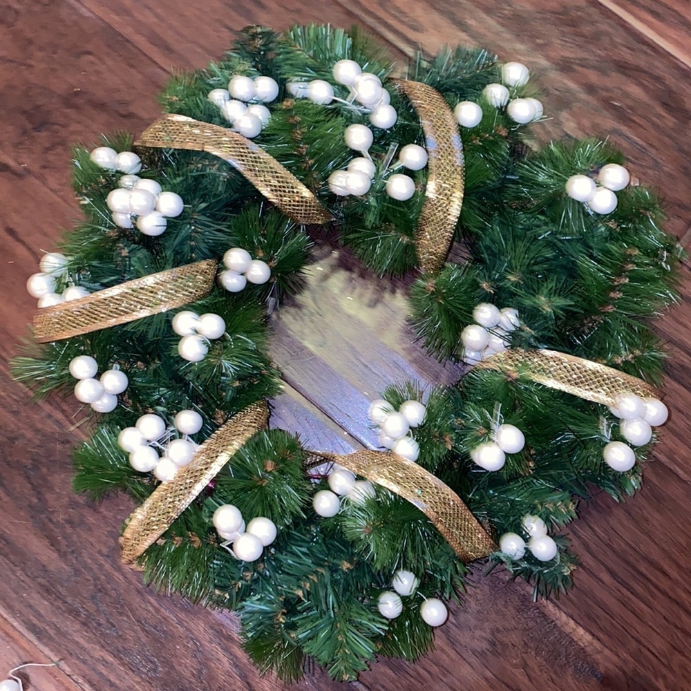 Green Holiday Wreath 15” across 10” wreath base includes gold ribbon pearl balls